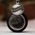 Vintage sterling silver darling pendant pictured with antique hand-engraved hub